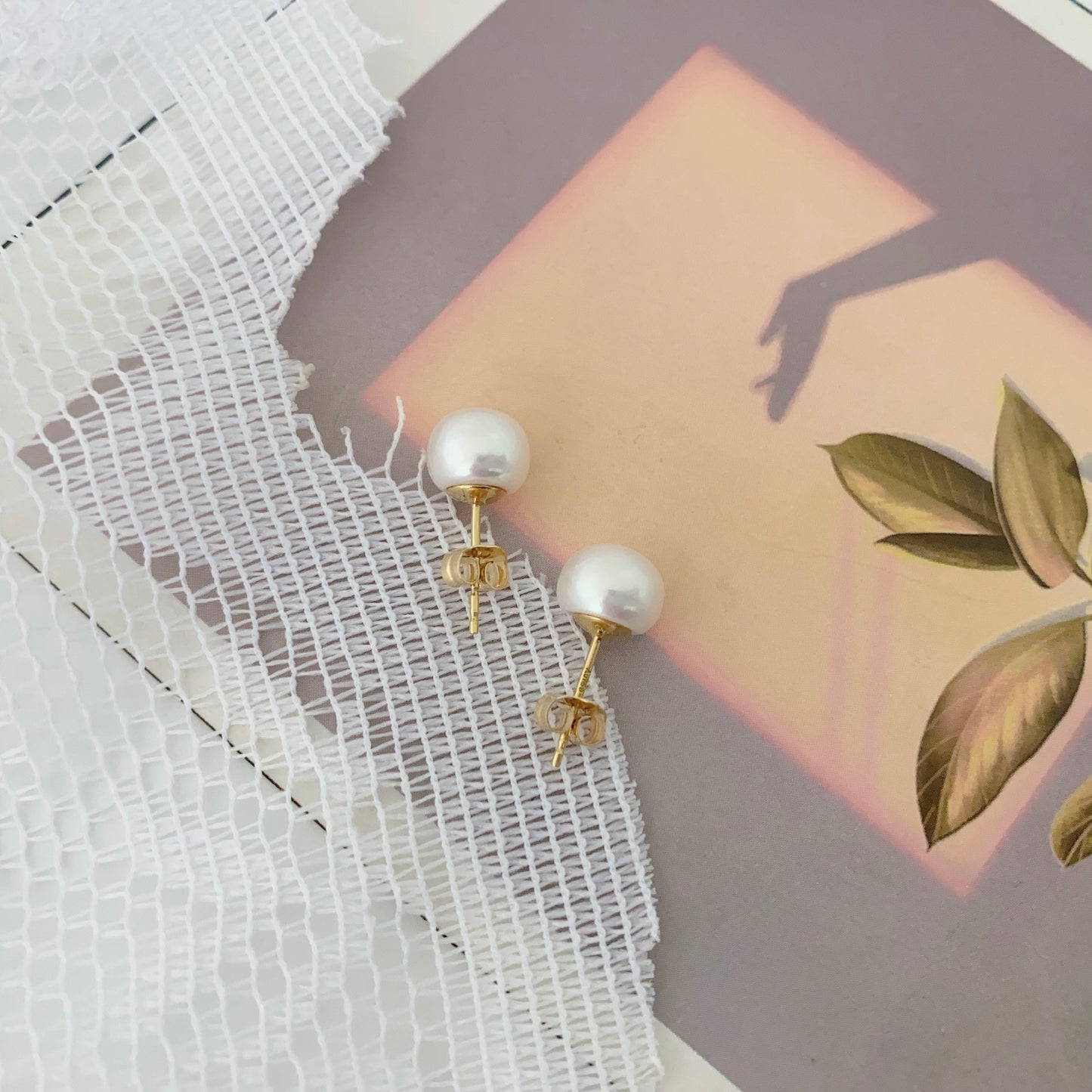 Les boucles d'oreilles en perles d'eau douce