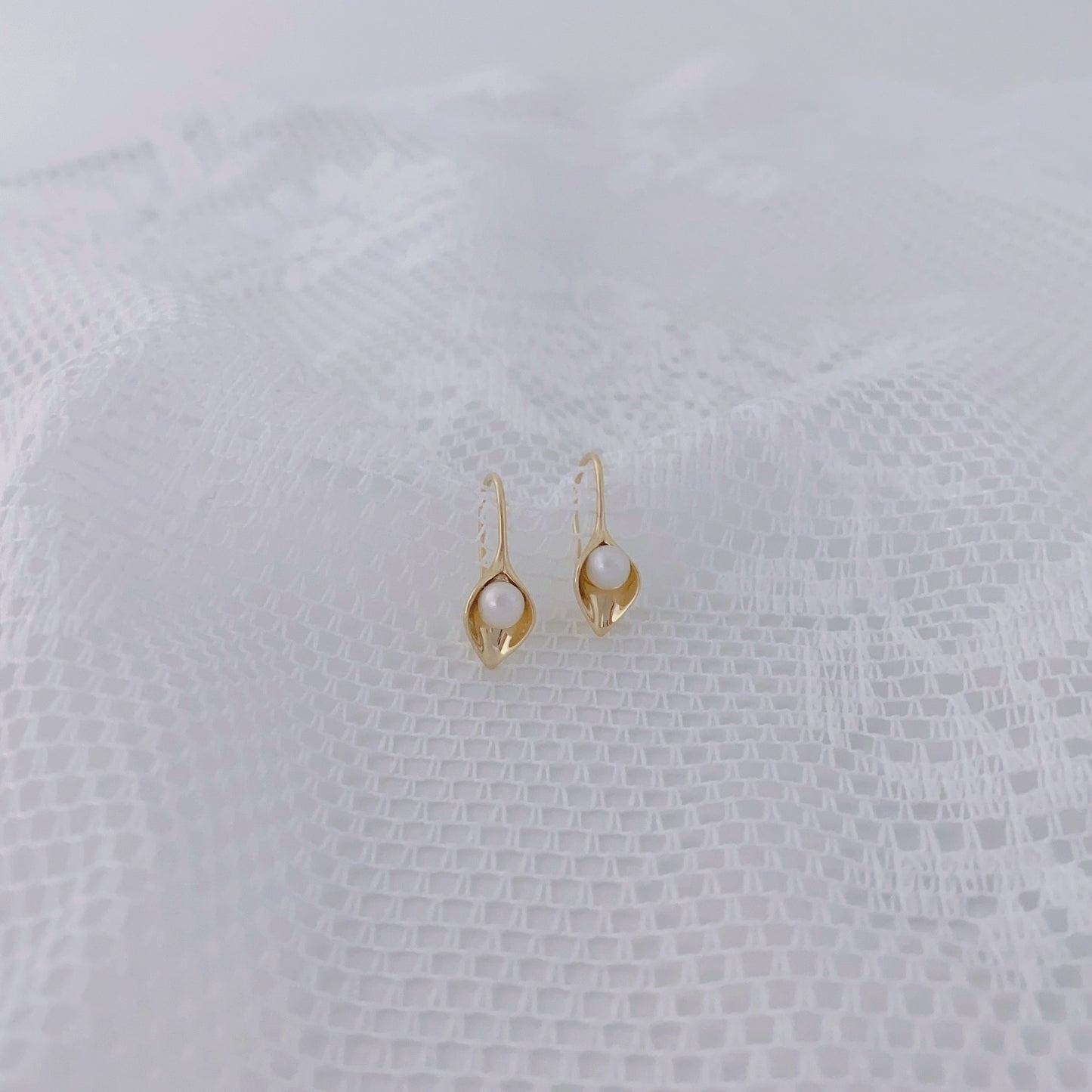 Les boucles d'oreilles en perles tombantes