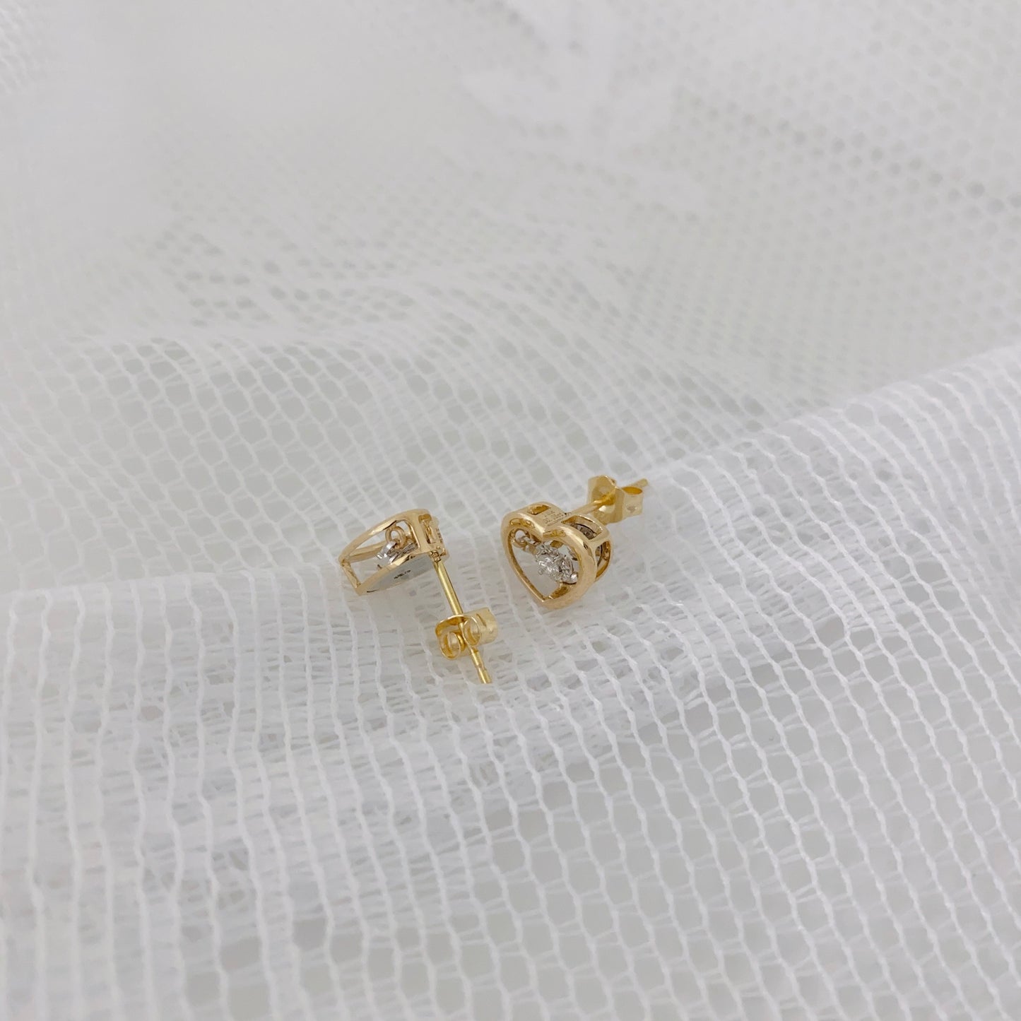 Les boucles d'oreilles Heartbeat