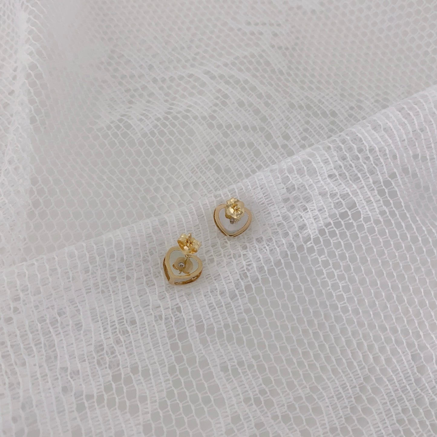 Les boucles d'oreilles Heartbeat